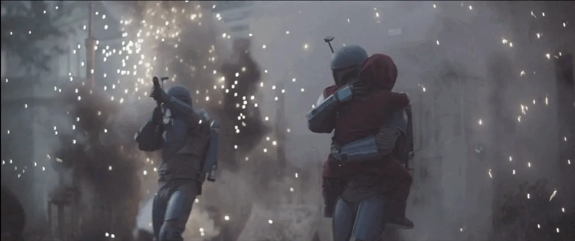 Le jeune Din Djarin est secouru par le Death Watch durant l'attaque d'Aq Vetina