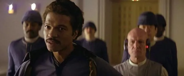 Lobot aux côtes de Lando.