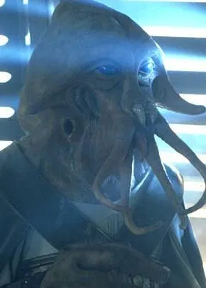 Tessek assistant fébrilement à l'exécution de Luke Skywalker à bord de la barge à voiles.