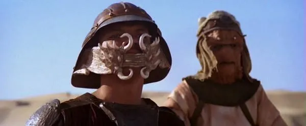 Le Kajain'sa'Nikto Vedain aux côtés de Tamtel Skreej (Lando Calrissian).