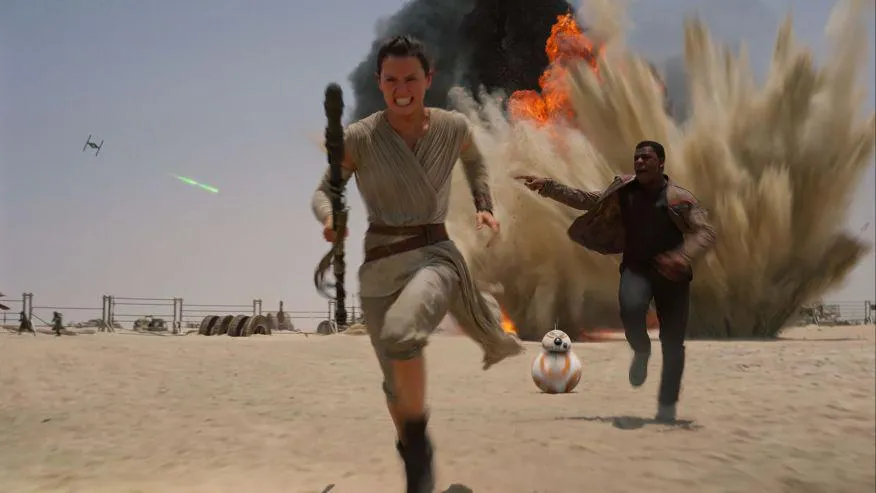 Rey et Finn fuient Jakku